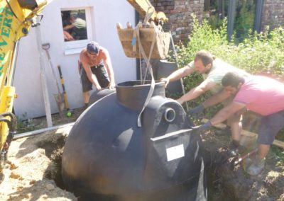 Aménagement complet d'un jardin à Oupeye.

- Pose d'une citerne d'eau de pluie. 
- Réalisation de...