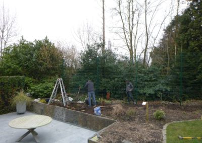Installation d'une clôture XXL de 3 mètres de hauteur qui devra servir de support pour un mur vég...