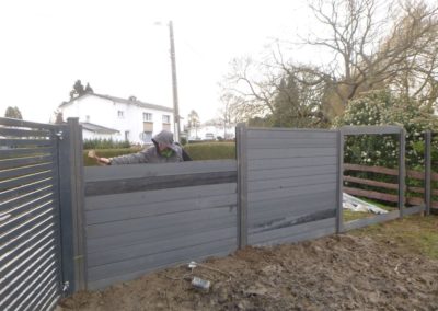 Rénovation d'un petit jardin à Ans.

Remplacement des vielles palissades de bois par une palissade...
