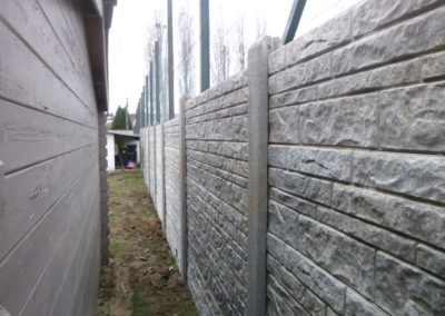 Rénovation d'un petit jardin à Ans.

Remplacement des vielles palissades de bois par une palissade...