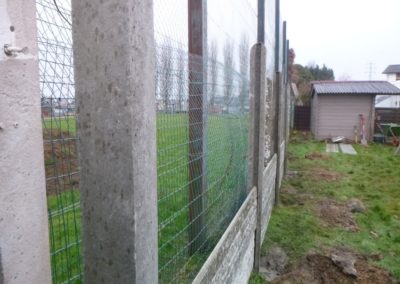 Rénovation d'un petit jardin à Ans.

Remplacement des vielles palissades de bois par une palissade...