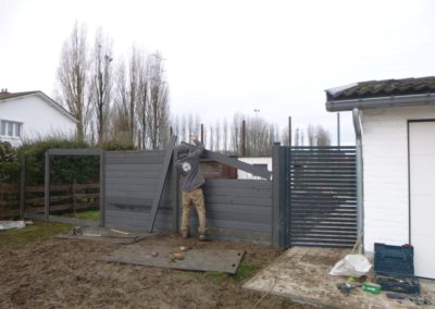 Rénovation d'un petit jardin à Ans.

Remplacement des vielles palissades de bois par une palissade...