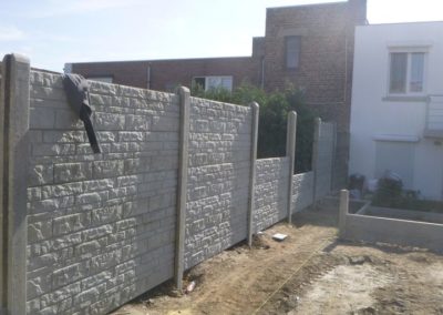 Aménagement complet d'un petit jardin à Herstal, création d'un espace parking, placement de palis...