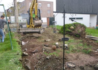 Aménagement complet d'un petit jardin à Herstal, création d'un espace parking, placement de palis...