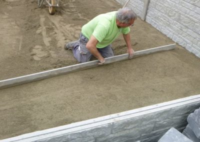 Aménagement complet d'un petit jardin à Herstal, création d'un espace parking, placement de palis...