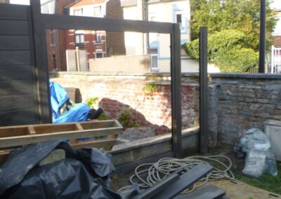 Réaménagement d'un très petit jardin à Ans.

Construction d'une nouvelle terrasse en pierre de t...